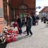 Uroczystość złożenia kwiatów pod tablicą poświęconą pochodzącym z Wołynia pierwszym powojennym osadnikom w Malborku