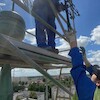 Montaż kapsuły czasu na Ratuszu Staromiejskim